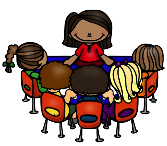 Kids with teacher at table